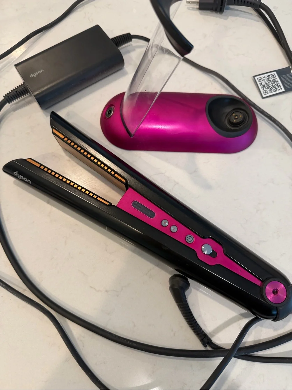 Dyson hair straightener in black and pink